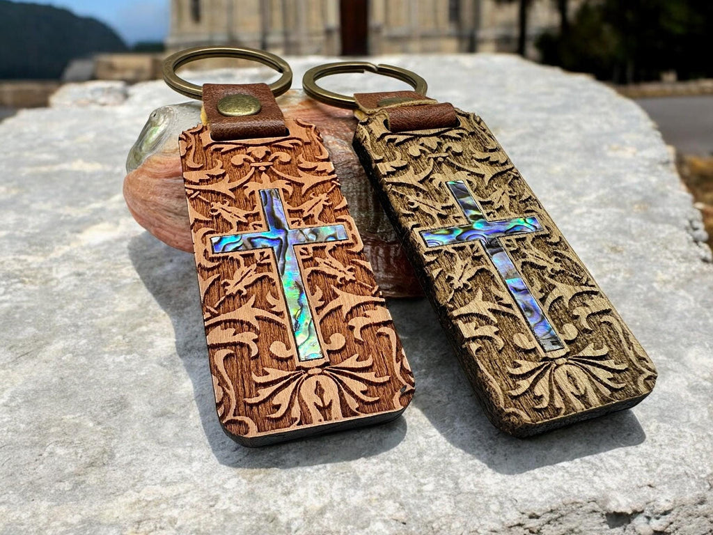 This stunning keychain features a unique combination of abalone shell and custom wood design, making it a truly one-of-a-kind accessory.